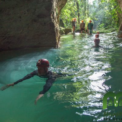 Swimming at Belize ATM Cave Tour